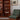 Mid-century Børge Mogensen China bookcase and TH Brown armchairs in olive bouclé