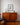 Mid-century Burgess teak sideboard with blackwood base