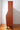 Right side view of teak veneer figuring and angled silhouette mid-century wall unit