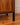 Closeup detail of leg on Kai Kristiansen rosewood record cabinet 