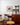Scandinavian vintage dining chairs with sculpted rosewood backs and tan vinyl seats