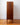 Left side view of mid-century Danish tallboy chest