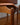 Closeup detail of patina on Han Hayson mid-century dressing table stool