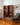 Side view of mid century Danish bookshelf by Borge Mogensen with TH Brown Chair and Scandinavian lamp