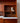 Lockable fold-down compartment on mid-century wall unit