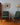 Pair of mid century TH Brown armchairs with Olive bouclé upholstery