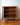 Interior of mid-century Parker bookshelf, in teak