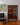 Front view mid-century Queensland blackbean display cabinet
