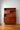 Mid-century modern teak veneer cabinet with fold-down bar and bookshelf