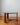 Side profile of mid-century TH Brown Rondo coffee table