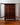 Interior view of glass shelves inside mid century display cabinet
